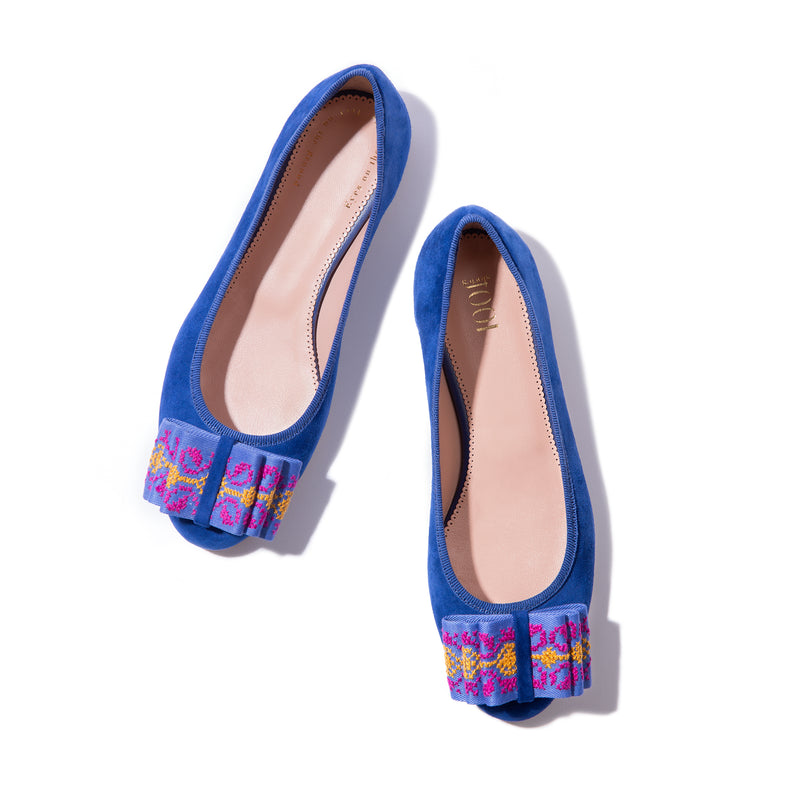 Blue suede ballet flats with hand-embroidered bow