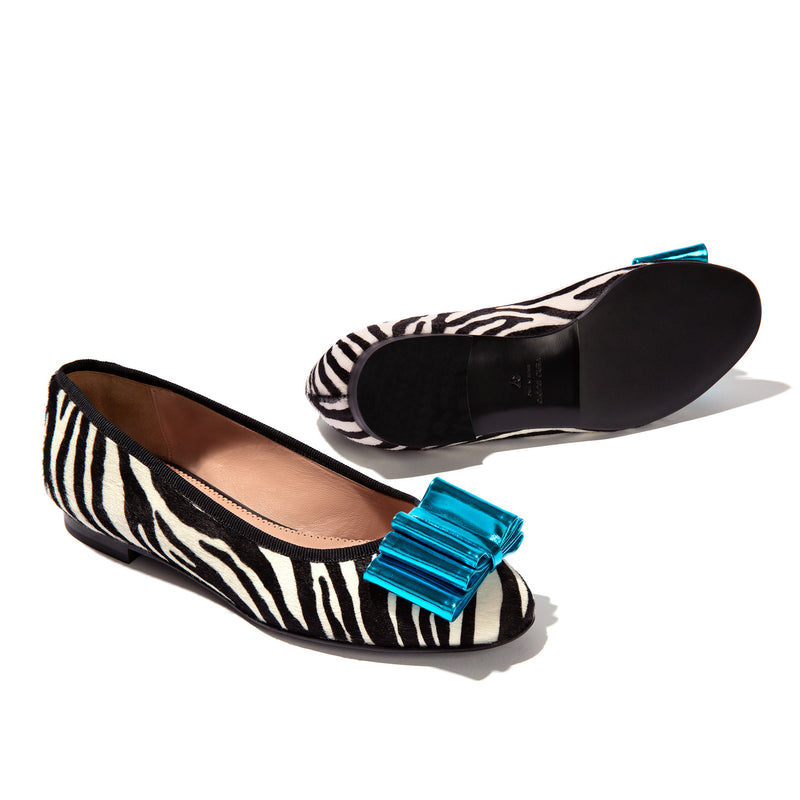 Faux zebra ballet flats with turquoise bow